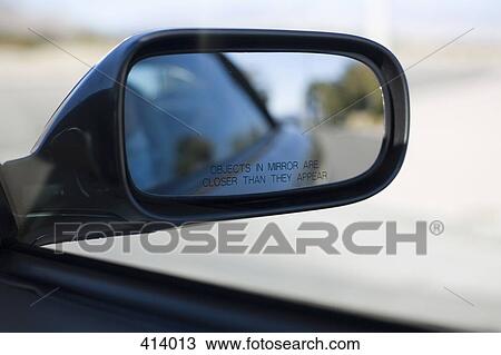 Stock Image - A car wing mirror. Fotosearch