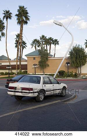 Car crashed into street light View Large Photo Image Stock Image - Car crashed into street light. Fotosearch