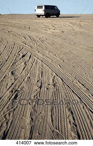 Stock Photo - Tyre tracks in sand. Fotosearch