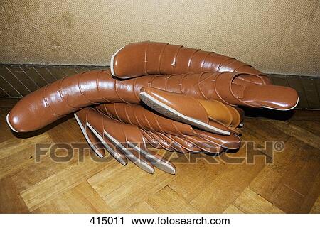 Stock Image - A heap of slippers. Fotosearch