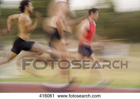 Group of athletes running on a track View Large Photo Image Stock Image - Group of athletes running on a track. Fotosearch