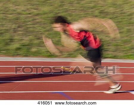 Male athlete running on a track View Large Photo Image Stock Image - Male athlete running on a track. Fotosearch
