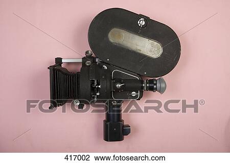 Stock Image - Old fashioned movie camera. Fotosearch