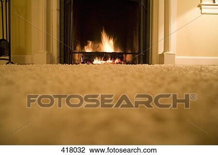Domestic room with log fire View Large Photo Image Stock Image - Domestic room with log fire. Fotosearch