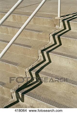 Handrail casting a shadow onto concrete steps View Large Photo Image Picture - Handrail casting a shadow onto concrete steps. Fotosearch