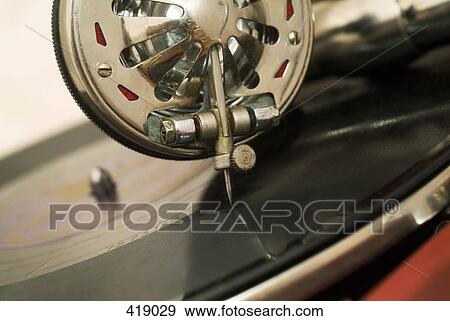 Close up of a needle and a record View Large Photo Image Stock Photo - Close up of a needle and a record. Fotosearch
