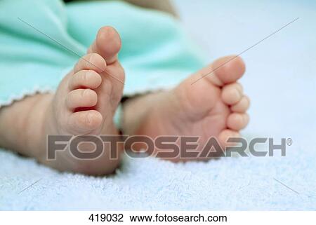 Close up of the feet of a baby View Large Photo Image Stock Image - Close up of the feet of a baby. Fotosearch