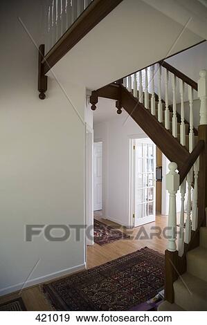 Entrance hall and staircase in a house View Large Photo Image Stock Photo - Entrance hall and staircase in a house. Fotosearch
