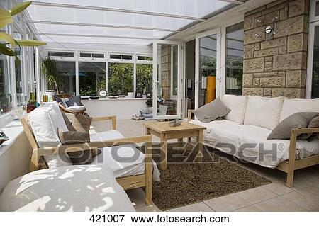 Lounge area of a conservatory View Large Photo Image Stock Photo - Lounge area of a conservatory. Fotosearch