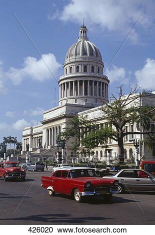 Busy street in front of El Capitolio, Havana Cuba View Large Photo Image Stock Image - Busy street in front of El Capitolio, Havana Cuba. Fotosearch