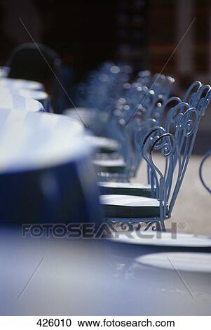 Ornate chairs at an outdoor cafe View Large Photo Image Stock Image - Ornate chairs at an outdoor cafe. Fotosearch