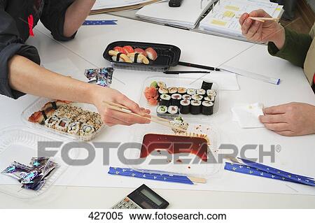Sushi lunch at work View Large Photo Image Stock Photography - Sushi lunch at work. Fotosearch