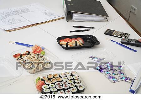 Stock Photography - Sushi lunch at work. Fotosearch