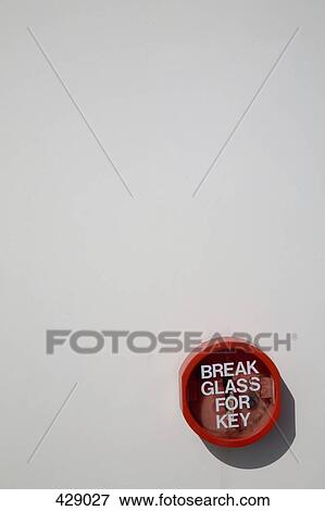 Stock Photo - Emergency exit key on a wall. Fotosearch