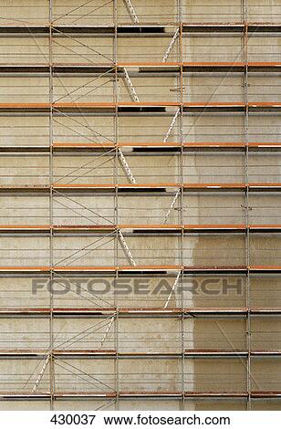 Scaffolding in front of a building View Large Photo Image Stock Photo - Scaffolding in front of a building. Fotosearch