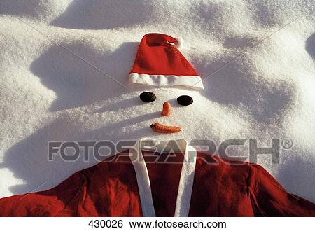 Snowman dressed up as Santa Claus in the snow View Large Photo Image Stock Photograph - Snowman dressed up as Santa Claus in the snow. Fotosearch
