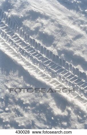 Tire track in the snow View Large Photo Image Stock Photo - Tire track in the snow. Fotosearch