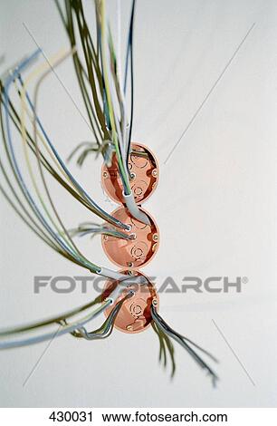 Wiring hanging from light fixtures View Large Photo Image Stock Image - Wiring hanging from light fixtures. Fotosearch