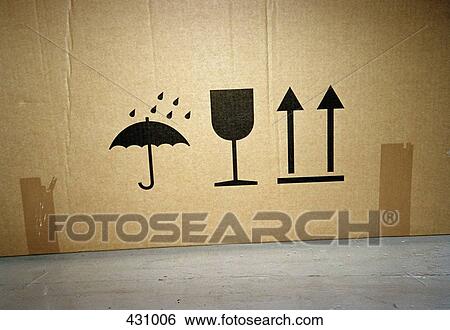 Symbols on a cardboard box View Large Photo Image Stock Photograph - Symbols on a cardboard box. Fotosearch