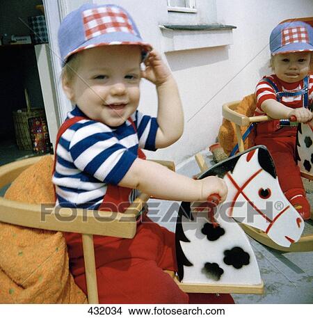 Children playing on rocking horses View Large Photo Image Picture - Children playing on rocking horses. Fotosearch