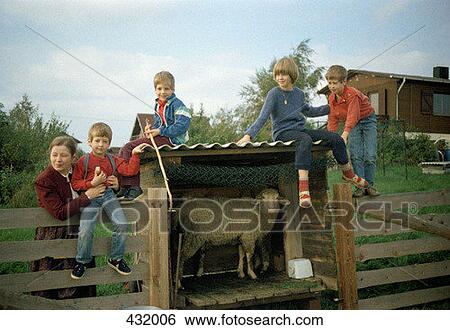 Children sitting on fence View Large Photo Image Stock Photograph - Children sitting on fence. Fotosearch
