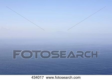 A foggy horizon over the sea View Large Photo Image Stock Photo - A foggy horizon over the sea. Fotosearch