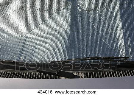 Car windshield being protected from the sun View Large Photo Image Stock Photograph - Car windshield being protected from the sun. Fotosearch