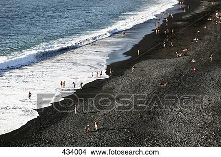 Picture - High angle view of people on a beach. Fotosearch