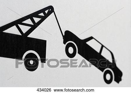 Stock Photograph - Information sign showing car being towed. Fotosearch