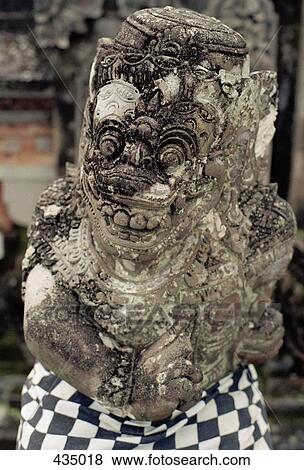 Stock Photo - Detail of a stone carving at Besakih Temple, Bali, Indonesia. Fotosearch