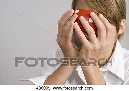 Woman drinking from a cup View Large Photo Image Stock Photography - Woman drinking from a cup. Fotosearch