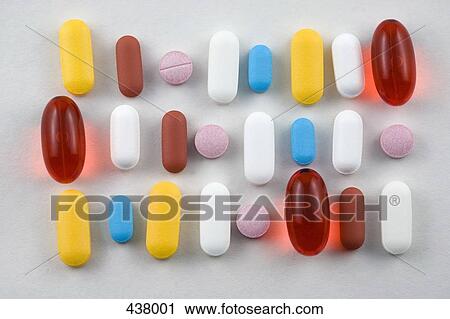 Stock Image - Colorful pills and capsules. Fotosearch