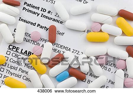 Pills and tablets scattered over a medical document View Large Photo Image Stock Photograph - Pills and tablets scattered over a medical document. Fotosearch