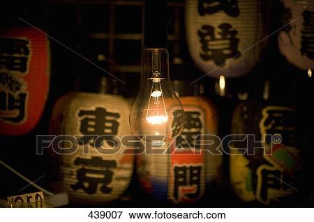 Illuminated light bulb amongst Japanese lanterns View Large Photo Image Stock Photo - Illuminated light bulb amongst Japanese lanterns. Fotosearch