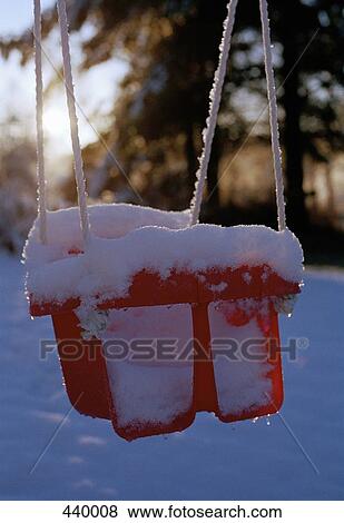 Children's swing covered in snow View Large Photo Image Stock Photo - Children's swing covered in snow. Fotosearch