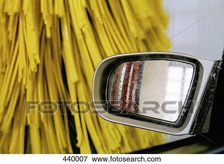 Side view mirror of a car in a car wash View Large Photo Image Stock Photo - Side view mirror of a car in a car wash. Fotosearch
