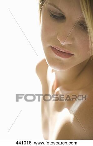 Young woman with bare shoulders View Large Photo Image Stock Photograph - Young woman with bare shoulders. Fotosearch