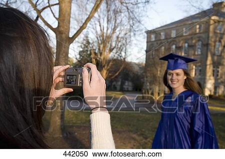 Female student celebrating graduation View Large Photo Image Stock Image - Female student celebrating graduation. Fotosearch