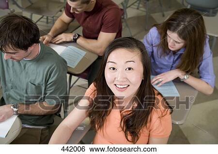 Group of students in lecture room View Large Photo Image Stock Photograph - Group of students in lecture room. Fotosearch