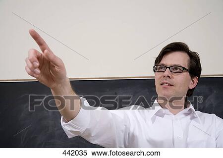 Stock Photography - Lecturer pointing. Fotosearch