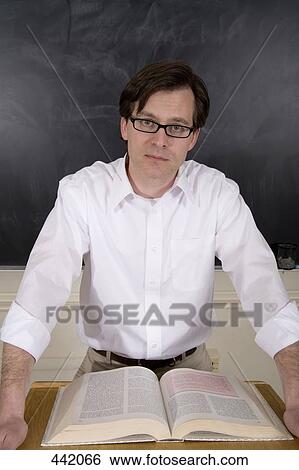 Lecturer standing behind lectern View Large Photo Image Stock Photograph - Lecturer standing behind lectern. Fotosearch