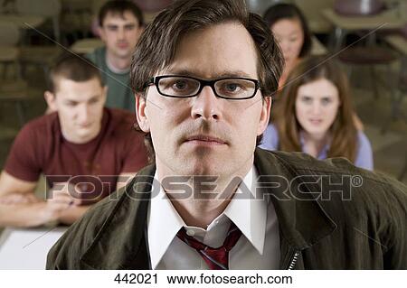 Stock Image - Lecturer standing in front of students. Fotosearch