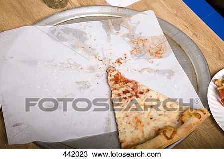 Stock Image - Slice of pizza on tray. Fotosearch