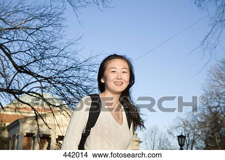 Picture - Student outside of university. Fotosearch