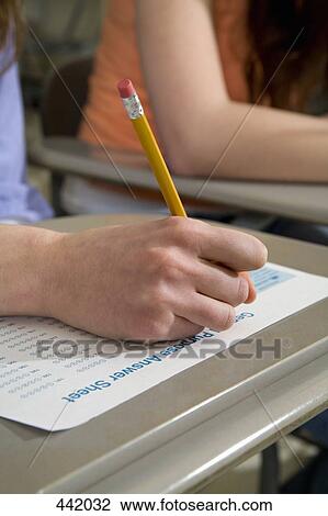 Student taking an exam View Large Photo Image Stock Image - Student taking an exam. Fotosearch