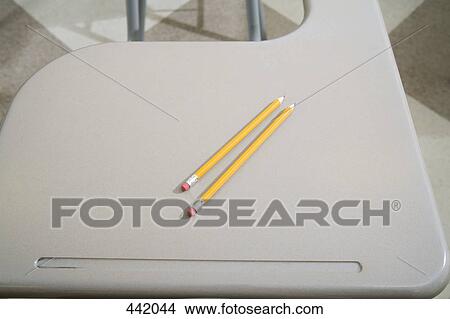 Two pencils on a desk View Large Photo Image Picture - Two pencils on a desk. Fotosearch