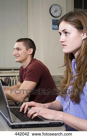 Two university students studying View Large Photo Image Stock Image - Two university students studying. Fotosearch