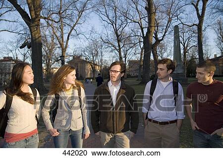 University students and lecturer walking outside View Large Photo Image Stock Image - University students and lecturer walking outside. Fotosearch