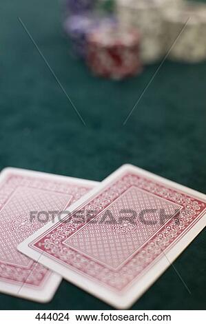Picture - Two playing cards and piles of gambling chips on a table, Las Vegas, Nevada. Fotosearch