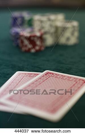 Two playing cards and piles of gambling chips on a table, Las Vegas, Nevada View Large Photo Image Stock Photo - Two playing cards and piles of gambling chips on a table, Las Vegas, Nevada. Fotosearch